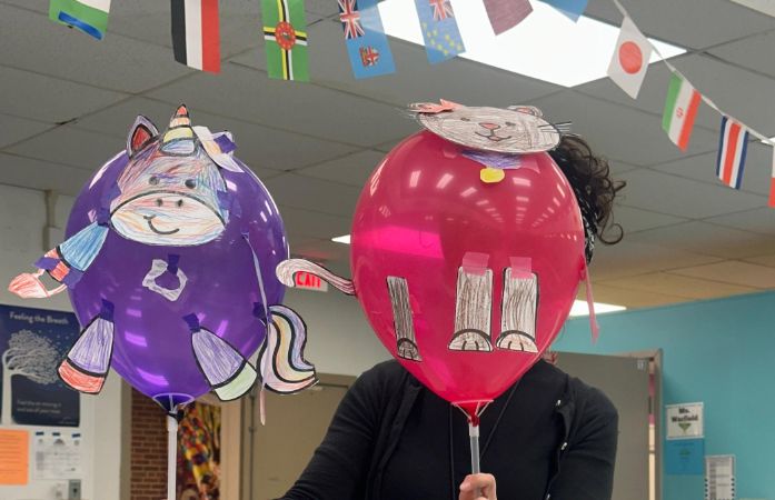  teacher holding balloon designs